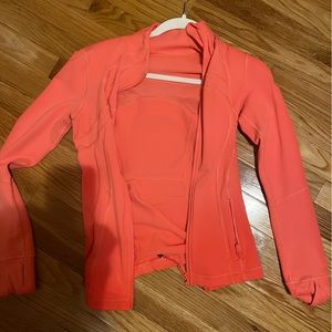 Lululemon define jacket size 6. Light blue, pink/red color,  and purple.